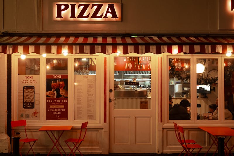 Mod Pizza dining room interior with warm lighting and inviting atmosphere