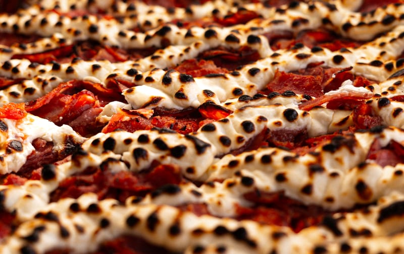 Artisan pizza crust being prepared at Mod Pizza